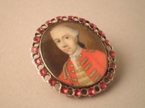 An early 18thC portrait miniature of a gentleman wearing a red military dress jacket