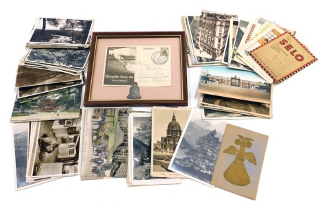 An Olympic Spiel 1936 Berlin presentation bell and postcard, framed, and a small group of similar period postcards, to include London, French town scenes, The Alps and others. (a quantity)