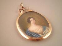 An 18thC portrait miniature of a lady wearing a cream dress with blue cloak