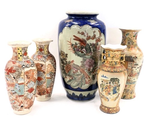 A pair of Japanese earthenware vases, each decorated with figures and with raised enamels, and various modern oriental vases.