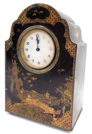 An early 20thC tin mantel time piece, with chinoiserie decoration of figures, buildings, etc., on a black ground, unmarked, possibly Victory V, 31cm high.