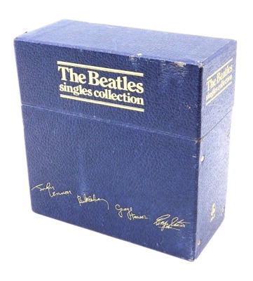 A Beatles blue box singles collection, with facsimile signatures to the box, comprising 26 singles, four AA sides, etc.