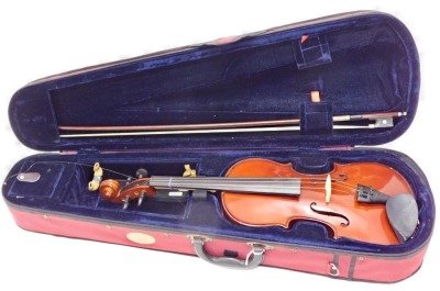 A Stentor student II violin, with bow and fitted case.