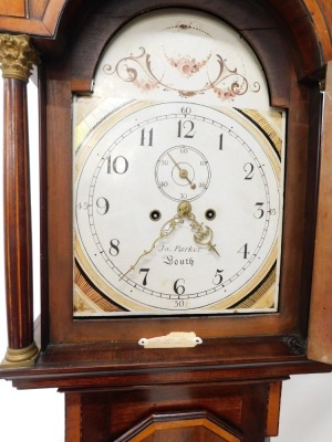 An early 19thC longcase clock, by John Parker of Louth, the arched painted dial decorated with gilt stylised fans, etc., in a mahogany fruit wood chequer banded case, 225cm high. - 2