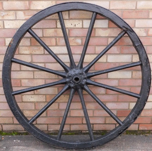 A large cartwheel, with hub stamped for The Globe Works in Wellington, 122cm diameter.