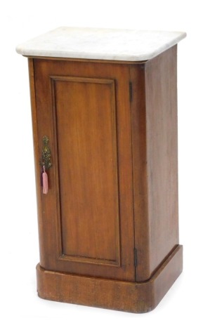 A Victorian mahogany pot cupboard, with a white marble top, and a panelled door with plinth, 76cm high, 40cm wide.