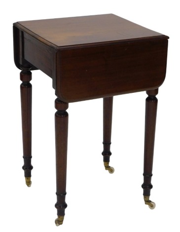 A Victorian mahogany work table, the rectangular drop leaf top with moulded edges, above a frieze drawer, on turned legs, with brass and ceramic castors, 178cm wide.