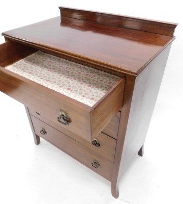 An early to mid 20thC mahogany chest of drawers, with a raised back above four drawers, each with drop handles, on splayed legs, 77cm wide. - 2