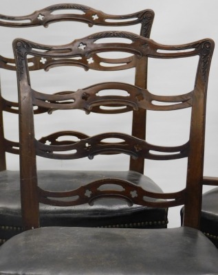 A set of six late 19th/early 20thC mahogany dining chairs, in George III style, each with a pierced ladder back, a brown brass studded leather seat, on scroll carved legs, with H stretcher. - 2