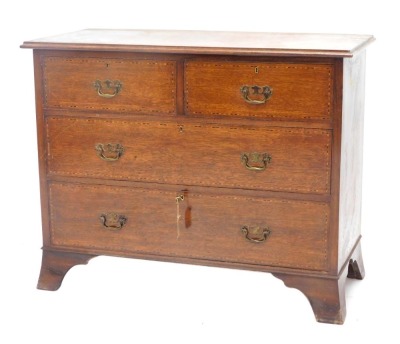 A late 19th/early 20thC oak and chequer banded chest of drawers, the top with a moulded edge above two short and three long drawers, on splayed feet, 107cm wide.