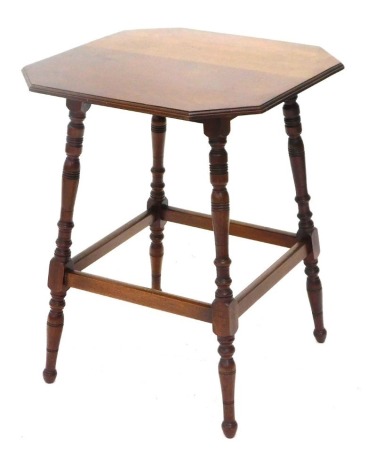 A late 19th/early 20thC walnut occasional table, square top with cantered corners on turned supports, 50cm wide.