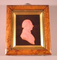 A 19thC red wax profile of a gentleman