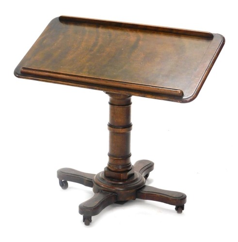 A Victorian Carter's patent invalid table, the rectangular adjustable top, on a turned column and star shaped base, with castors, 80cm wide.