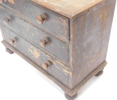 A Victorian painted pine chest of drawers, top with a moulded edge above two short and two long drawers, on bun feet, 77cm high, 93cm wide. - 2