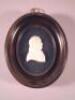 A 19thC carved ivory miniature of a gentleman