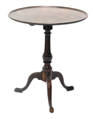 A 19thC mahogany occasional table, the circular dish tilt top on a turned column, with tripod base, with pad feet.