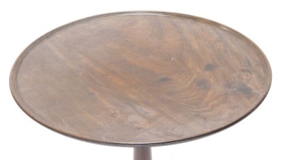 A 19thC mahogany occasional table, the circular dish tilt top on a turned column, with tripod base, with pad feet. - 2