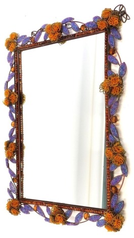 A metal and multi-coloured bead work rectangular wall mirror, decorated with flowers and leaves, 76cm high, 48cm wide.