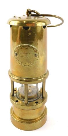 A small brass miners lamp, bearing stamp Lamp and Limelight Collier Company Hockley, 17cm high.