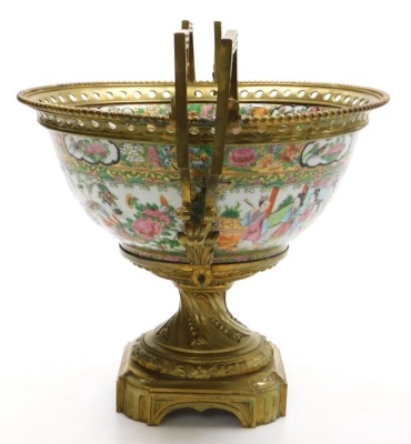 A 19thC Cantonese famille rose porcelain and ormolu mounted bowl, with a beaded and pierced mount and angular scroll handles, the bowl decorated with reserves of figures, and birds, butterflies and flowers, within a gilt ground decorated with fruit, flowe - 4