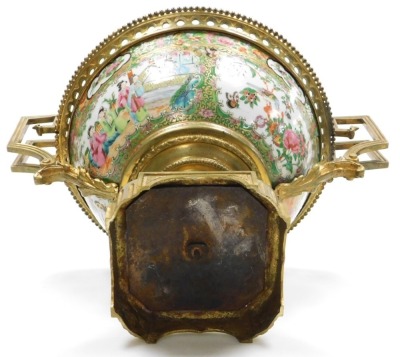 A 19thC Cantonese famille rose porcelain and ormolu mounted bowl, with a beaded and pierced mount and angular scroll handles, the bowl decorated with reserves of figures, and birds, butterflies and flowers, within a gilt ground decorated with fruit, flowe - 6