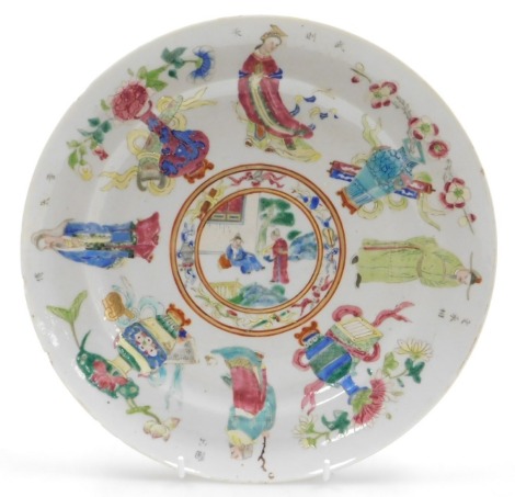 A Tongzhi period famille rose porcelain plate, decorated with Wu Shuang Pu figures, vases and scrolls, 25cm wide. (AF)