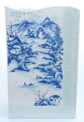 A 20thC Chinese blue and white and celadon porcelain stick stand, of rectangular section, with a wavy top and twin division interior, decorated with a river landscape, and moulded with a partial frame of leaves and lillies, signed, 43cm high, 26cm wide. - 5