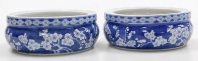 A pair of Chinese blue and white porcelain urn stands, or bowls, decorated with prunus blossom on a cracked ice ground, bears four character Wanli mark, 20cm wide. - 2