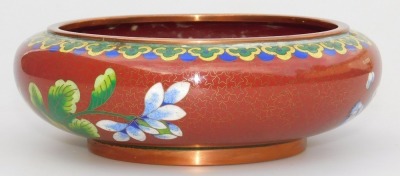 A Chinese iron red ground cloisonne enamel vase, of baluster form, decorated with blue flowers within a ground of gilt stars, 20.5cm high, and similar bowl, 16cm wide. (2) - 12