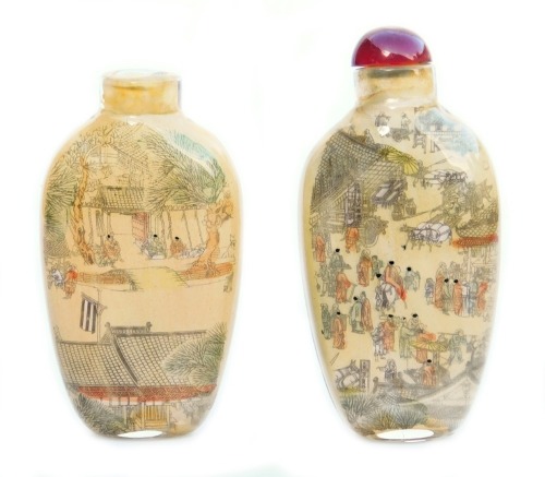 Two Chinese inside painted glass snuff bottles, one painted with figures in a landscape, with stopper, 7.5cm high, the other with figures and buildings aside a boat, verso script and titled 'River Scene', stopper lacking, 6.5cm high. (2)