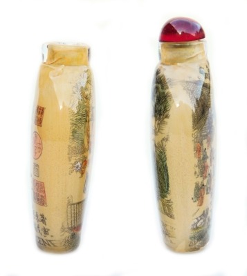 Two Chinese inside painted glass snuff bottles, one painted with figures in a landscape, with stopper, 7.5cm high, the other with figures and buildings aside a boat, verso script and titled 'River Scene', stopper lacking, 6.5cm high. (2) - 4