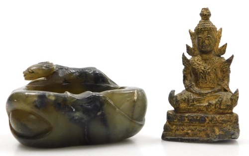 A Chinese soapstone brush washer, carved with an animal, 8cm wide, together with a gilt metal figure of Buddha, modelled seated, 8.5cm high. (2)