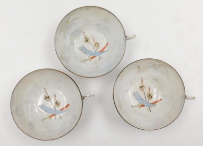 An early 20thC Japanese eggshell porcelain part tea service, painted with samurai and other figures, painted mark, comprising tea pot, covered cream jug, six tea cups, ten saucers and plates. - 8