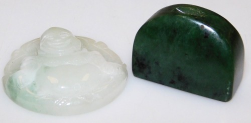 A jadeite pendant carved as the Happy Buddha, 5.5cm high, and a spinach jade carving, possibly a brush rest. (2)