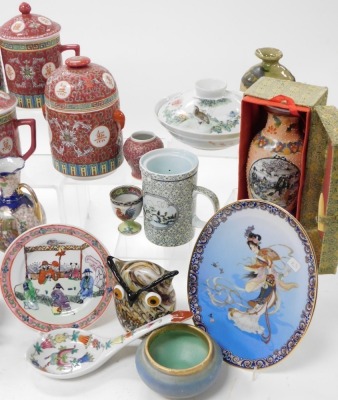 A group of Chinese and Japanese ceramics, etc., including red enamelled tankards and covers, jars and covers, rice bowl and cover, and a pair of Japanese vases. (a quantity) - 3