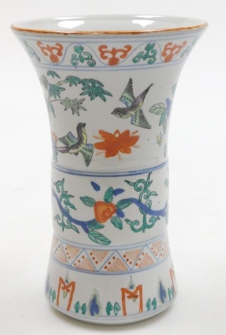 A 20thC Chinese porcelain wucai gu vase, decorated with flowers and scrolling branches, the top band with six character Wanli mark, 24cm high.