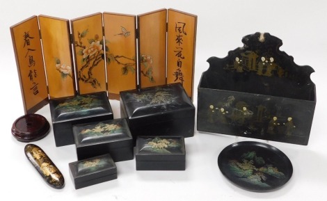 An early 20thC Chinese lacquered spectacle case, a wall mounted letter rack, set of graduated lacquer boxes, and a six fold table screen.