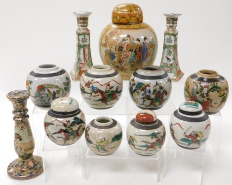 A group of Chinese crackle glaze ginger jars, together with a pair of Cantonese famille rose candlesticks, and Satsuma candlesticks. (a quantity)