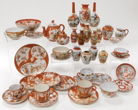 A group of Japanese Kutani pottery and porcelain, including vases, cream jugs, bowls and plates, tea cups and saucers. (a quantity)