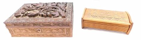 An Eastern hardwood box and other, carved in high relief with flowers, leaves, etc.