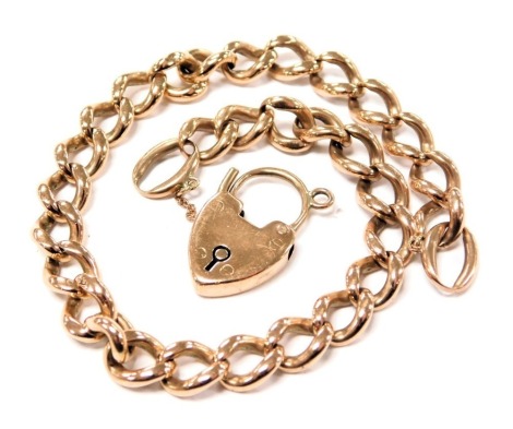 A 9ct rose gold curb link bracelet, on a heart shaped padlock clasp, 27g, 24.5cm long.