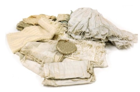 Victorian and later linen and lace, including an underskirt and trimmings, woollen baby's blanket, child's smocks and an evening bag.