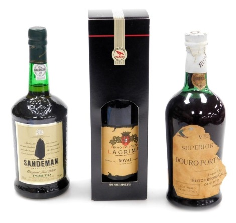 A bottle of Hutcheson & Company Superior port, labelled to neck, bearing serial no. EF15727, bottle of Sandeman original fine white port and a bottle of La Grima port, boxed. (3)