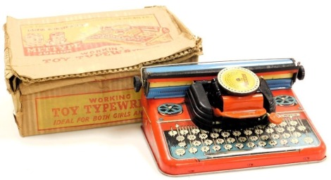 A Mettype Junior tin plate toy typewriter, boxed.