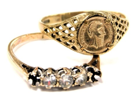 A 9ct gold and coin set signet ring, size Q, together with a 9ct gold and five stone ring, possibly white sapphires, two lacking, size N, 3.3g. (2)