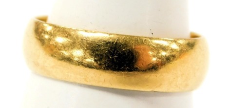 A 22ct gold wedding band, size P, 5.7g.