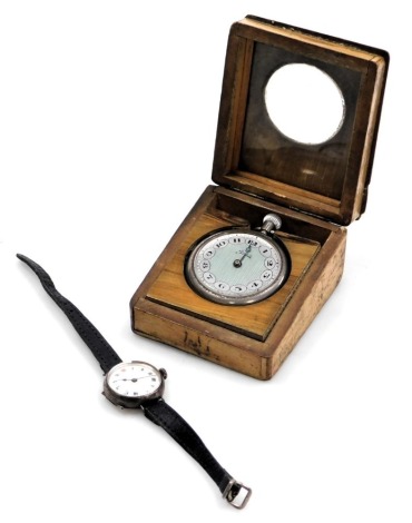 A Fides early 20thC gentleman's pocket watch, open faced, key less wind, in an olive wood pocket watch box, together with a lady's silver cased wristwatch, circular white dial bearing Roman numerals, on a leather strap. (3)