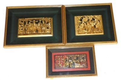 Three 19thC Chinese red and gilt lacquer furniture panels, each carved with figures, framed and glazed, 19m x 39cm, 29cm x 33.5cm, and 19cm x 31cm.