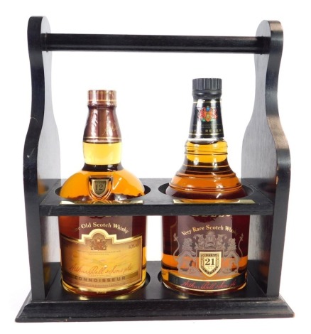An Arthur Bell & Sons whisky set, comprising Bell's twelve year old whisky and twenty one year old whisky, each 75cl, in an ebonised type Tantalus.