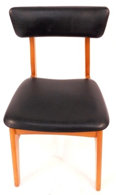 A set of four Schreiber dining chairs, each with a leatherette padded seat and back, on tapering legs. The upholstery in this lot does not comply with the 1988 (Fire & Fire Furnishing) Regulations, unless sold to a known exporter or upholsterer it will be - 2